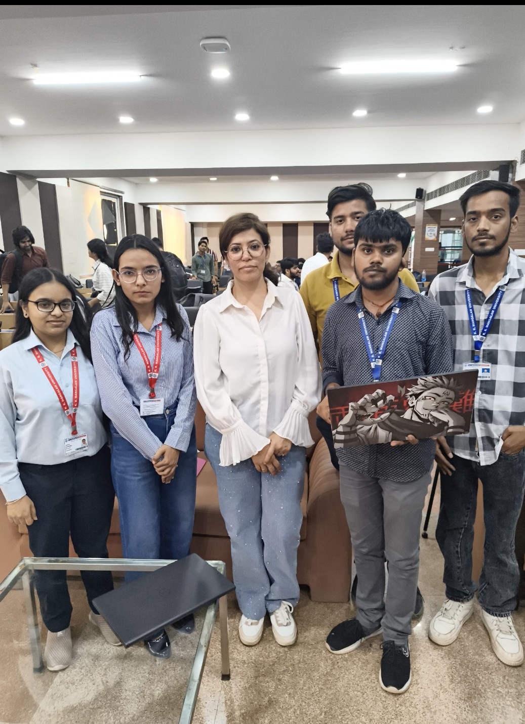 StarkMind team members with a faculty member at the ceremony